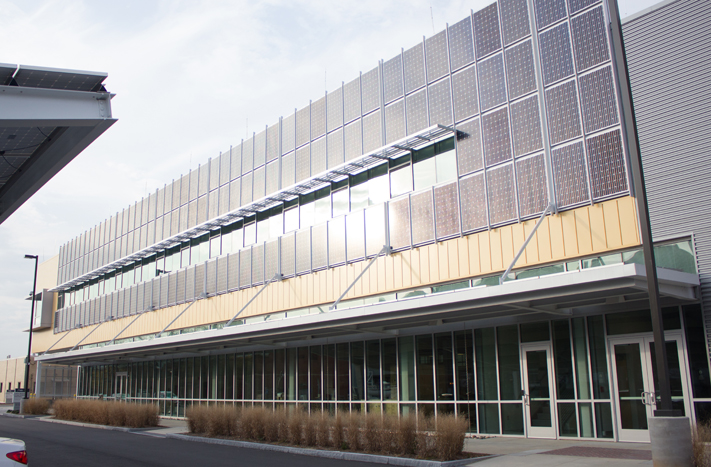 The Carbon Neutral Energy Solutions Laboratory features photovoltaic arrays for solar power, generating 290 kW. The building was awarded Platinum LEED status for its sustainability measures.