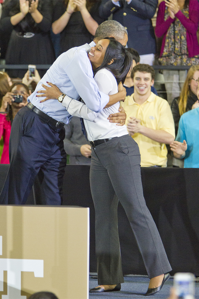 President Obama hugs Tiffany Davis after she introduces him. Tiffany wrote a letter to the president back in October while procrastinating on Thermodynamics homework. // Photo by John Nakano